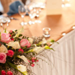 Detail shot of flowers on top table in the Almond Suite at Mercure Livingston Hotel