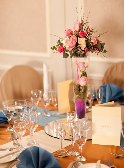 Close up of table arrangement in in the Almond Suite at Mercure Livingston Hotel, wedding breakfast, flowers