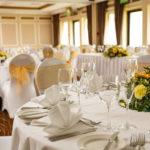 Yellow flower centrepiece, wedding breakfast