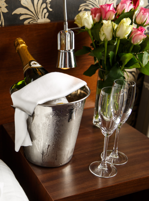 Privilege bedroom at Mercure Livingston Hotel, champagne in bucket